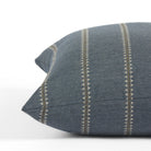 Side view of Tonic Living Talisman Denim decorative cushion highlighting its blue textured stripe design.