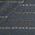 Tonic Living Talisman Sunbrella Outdoor Fabric in Denim, a dark blue indoor/outdoor upholstery fabric with an embroidered geometric stripe.