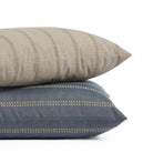 Tonic Living Talisman pillow collection in Sand and Denim Blue featuring embroidered stripe designs in neutral and blue tones.