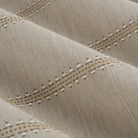 Close up of Tonic Living Talisman Sunbrella Sand fabric showing raised stitched stripe detail in sand and taupe.