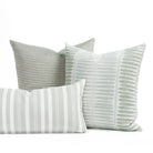 A selection of soft sage green, aqua and white indoor/outdoor throw pillows from Tonic Living.