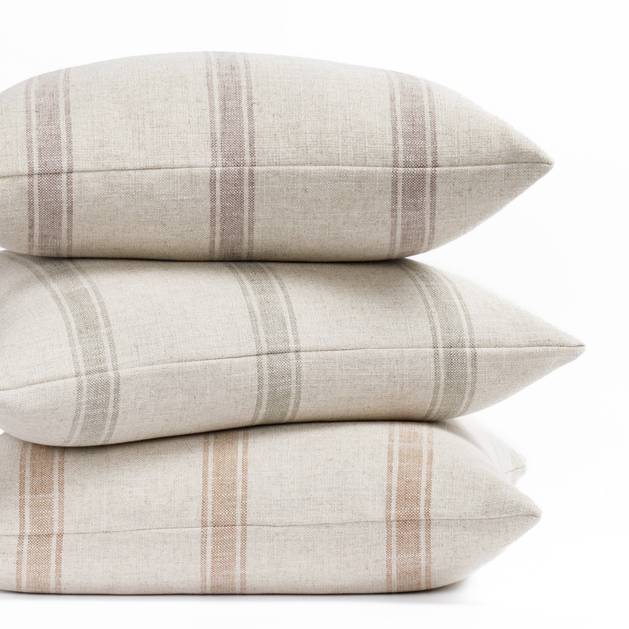 theo stripe pillows in mauve, rust and lake colourways