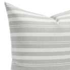 Tranquil Sage 20X20 pillow, a dusty sage and white striped indoor/outdoor pillow from Tonic Living: close-up view.