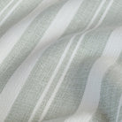 Tranquil Sage, a dusty aqua and soft white striped indoor/outdoor fabric from Tonic Living.
