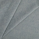 Close up of Tonic Living Troy Denim indoor/outdoor, high performance fabric showing rich blue linen-like texture.