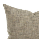 Close up of Tonic Living Troy outdoor cushion showing a multi-tone black, brown, and beige textured weave.