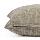 Side zipper detail of Tonic Living Troy 22x22 outdoor toss pillow in black, brown, and beige tones.
