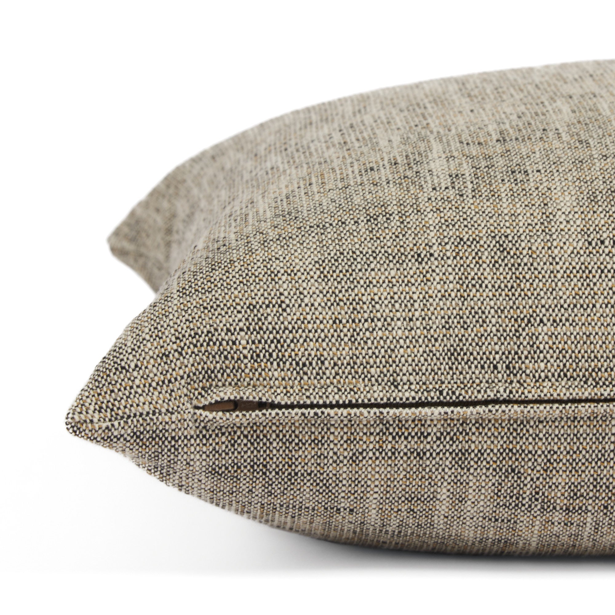 Side zipper detail of Tonic Living Troy 22x22 outdoor toss pillow in black, brown, and beige tones.