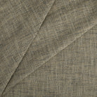 Tonic Living Troy InsideOut Sable indoor/outdoor upholstery fabric with a textured neutral blend of black, brown, and beige.