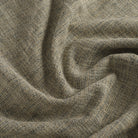 Close up of Tonic Living Troy InsideOut Sable fabric showing a multi-tone weave in black, brown, and beige.