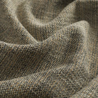 Close up of Tonic Living Troy InsideOut Sable performance fabric highlighting its textured, linen-inspired weave in neutral tones.