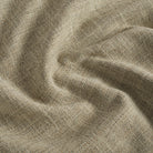 Close up of Tonic Living Troy InsideOut Tweed fabric showing textured beige and brown woven detail.