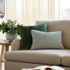 Designer toss pillows from Tonic Living, styled on a couch.