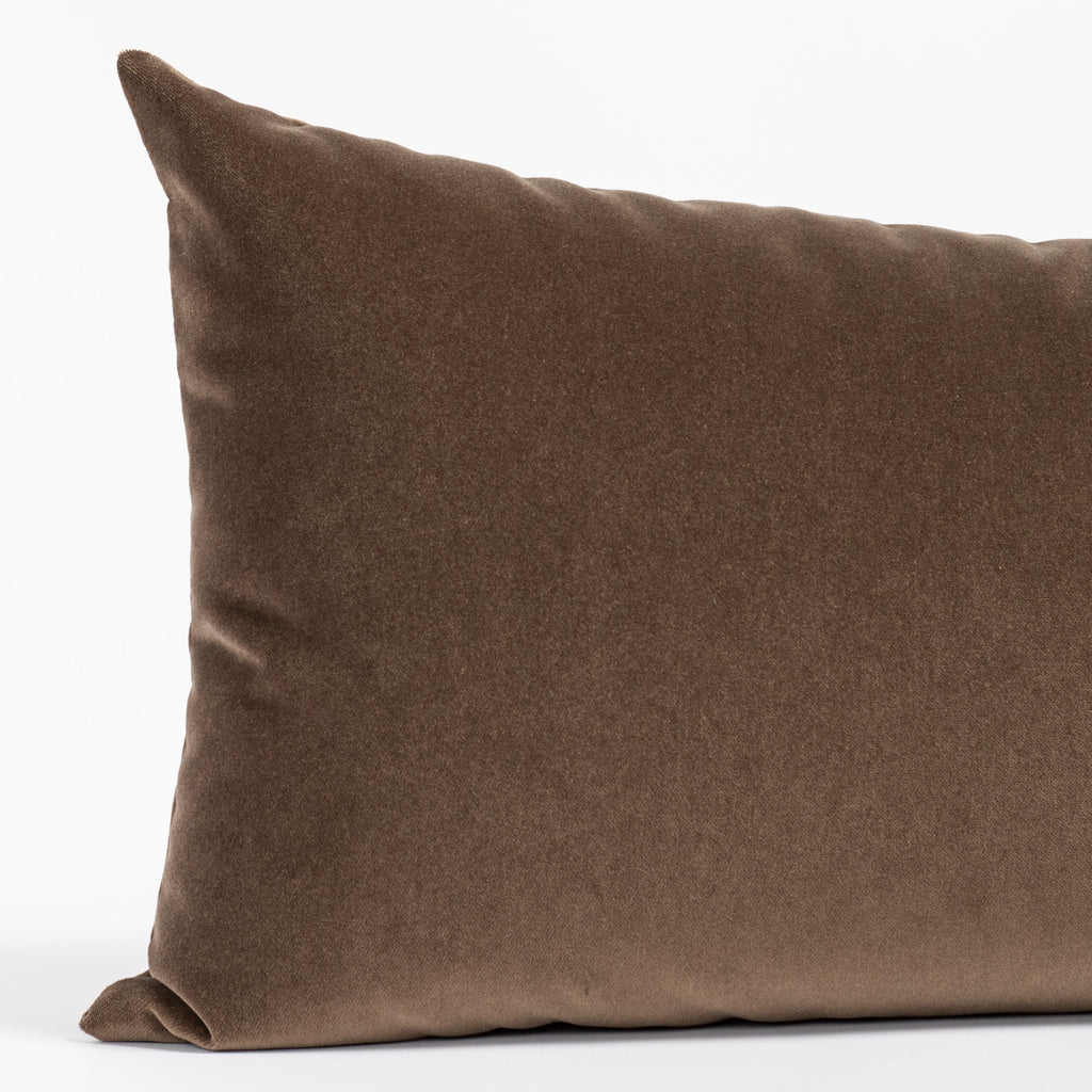 a rich brown velvet lumbar pillow - close up view