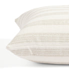 Side view of Tonic Living Vera Stripe decorative cushion highlighting its soft white stripe texture.