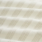 Tonic Living Vera InsideOut Pearl indoor/outdoor upholstery fabric with a refined tone-on-tone striped design.