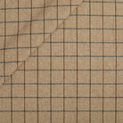 Tonic Living Walker Plaid Fabric in Camel, a camel and brown windowpane check multi-use fabric with a fine herringbone weave.
