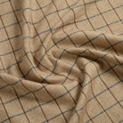 Tonic Living Walker Plaid Fabric in Camel, a plaid upholstery and drapery fabric with a tailored heritage-inspired pattern.