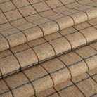 Tonic Living Walker Plaid Camel fabric shown as Roman shades with a classic menswear-inspired windowpane check.
