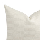 Close up of a Tonic Living Webster Buff pillow showing cream and greige checkerboard fabric detail.