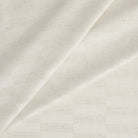 Tonic Living Webster Buff multi-use upholstery fabric with a modern cream and greige checkerboard pattern.