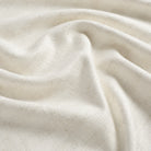 Tonic Living Webster Buff fabric featuring a neutral geometric checkerboard design in cream and beige tones.