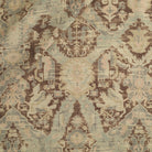 Tonic Living Zuri Fabric in Driftwood, a distressed ornamental medallion fabric with a faded, antique-inspired look.