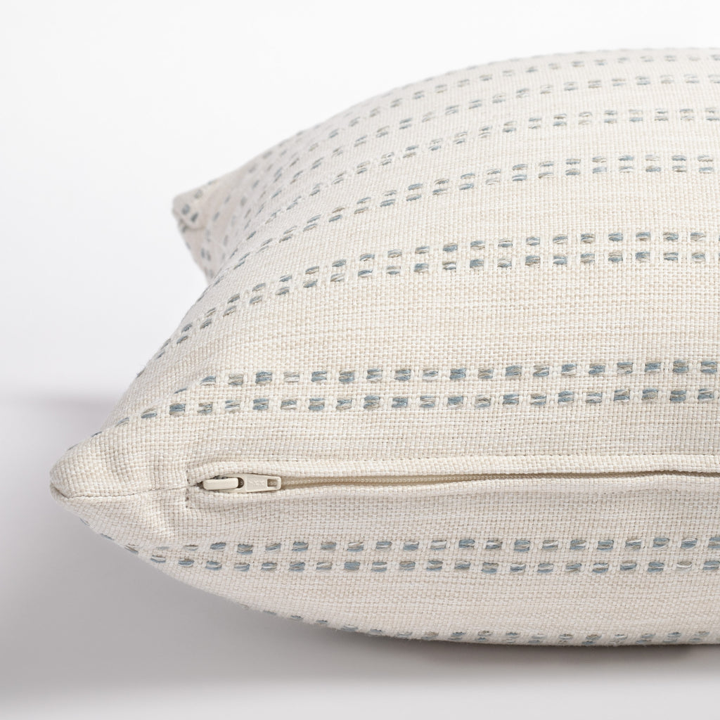Elodie Sky, a cream white with sky blue dotted stripe pillow from Tonic Living