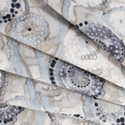 Majorca Fabric in Smoke by Ellen Degenres, a watery grey and blue floral from Tonic Living