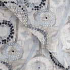 Majorca Fabric in Smoke by Ellen Degenres, a watery grey and blue floral from Tonic Living