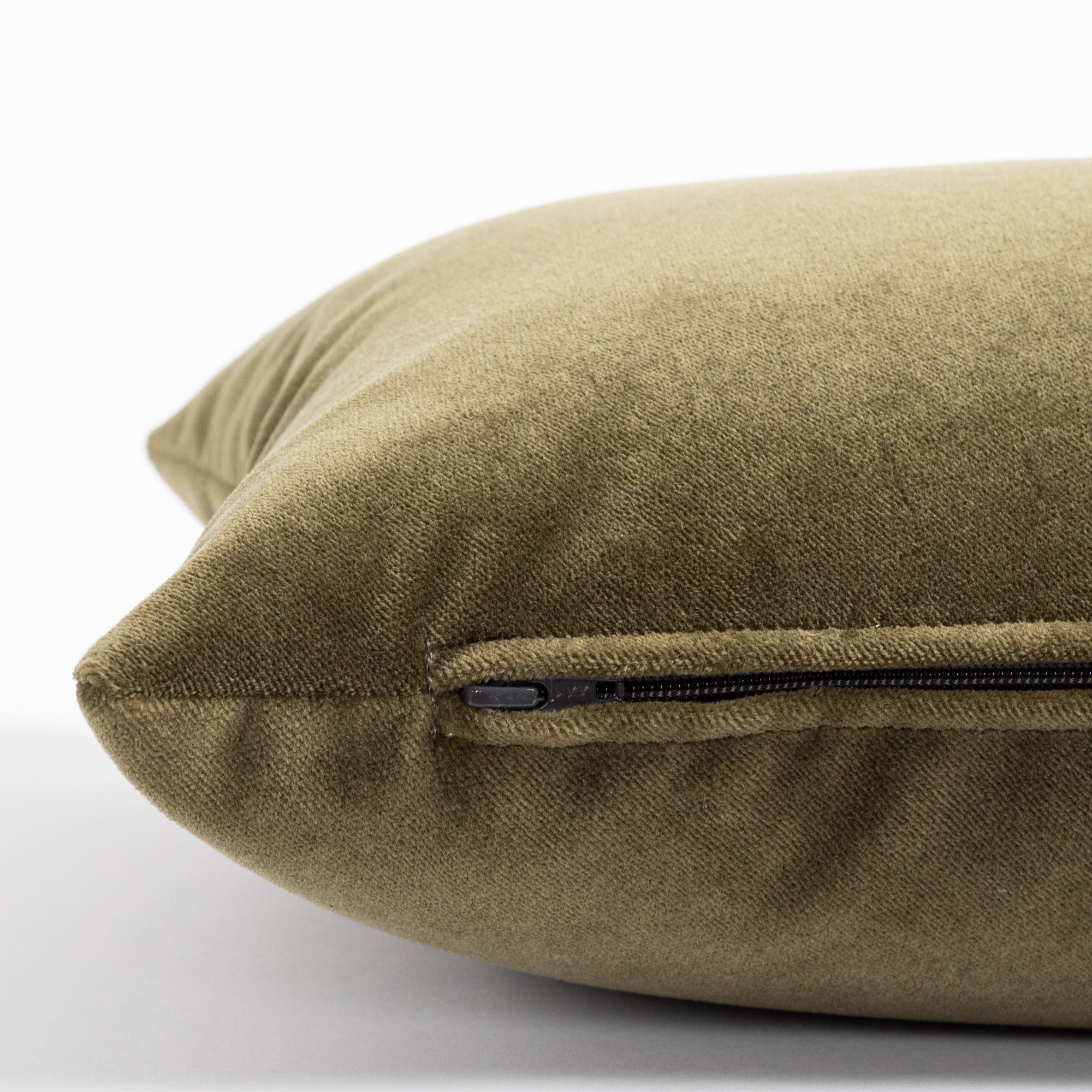 a velvet balsam green lumber pillow - zipper detail