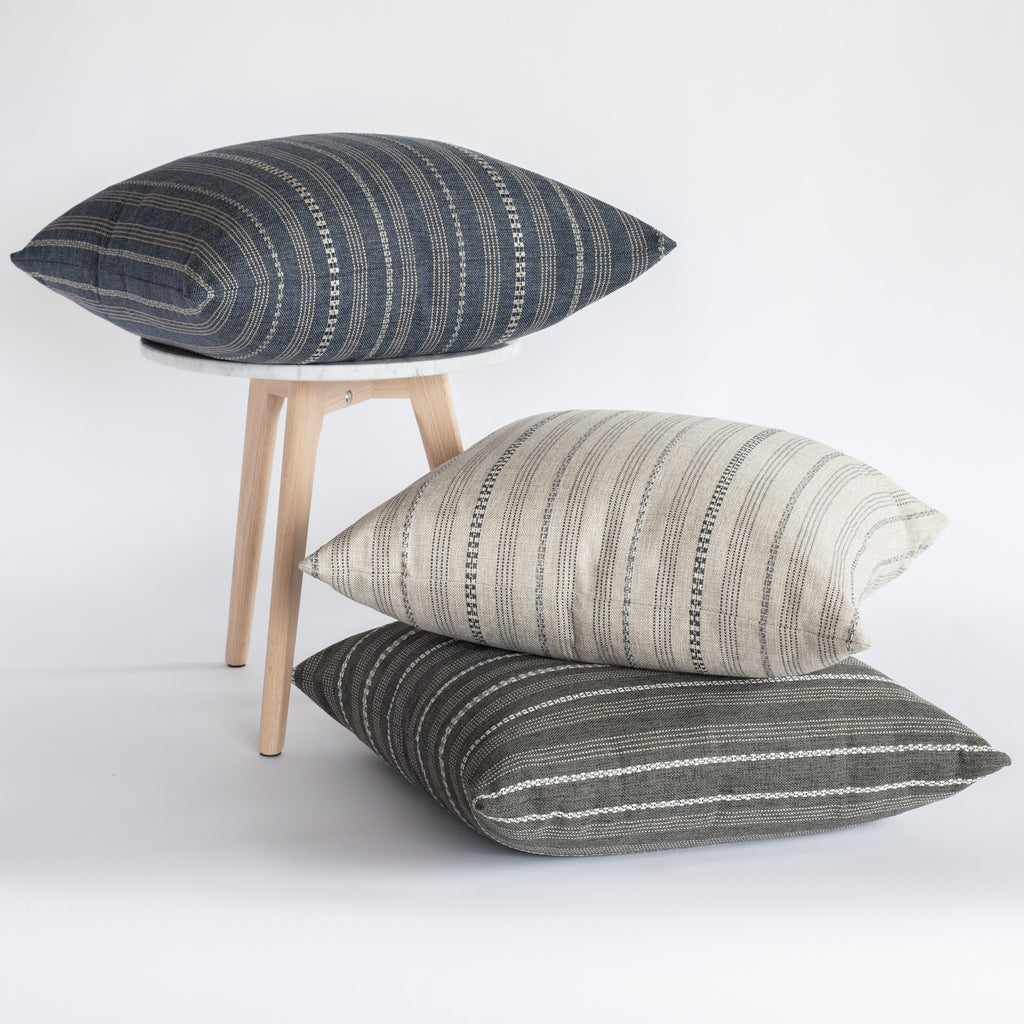 Anya Stripe pillow collection in Denim blue, carbon black and biscuit beige