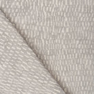 Avareno Silver, a light grey and sandy beige small scale abstract print fabric from Tonic Living 