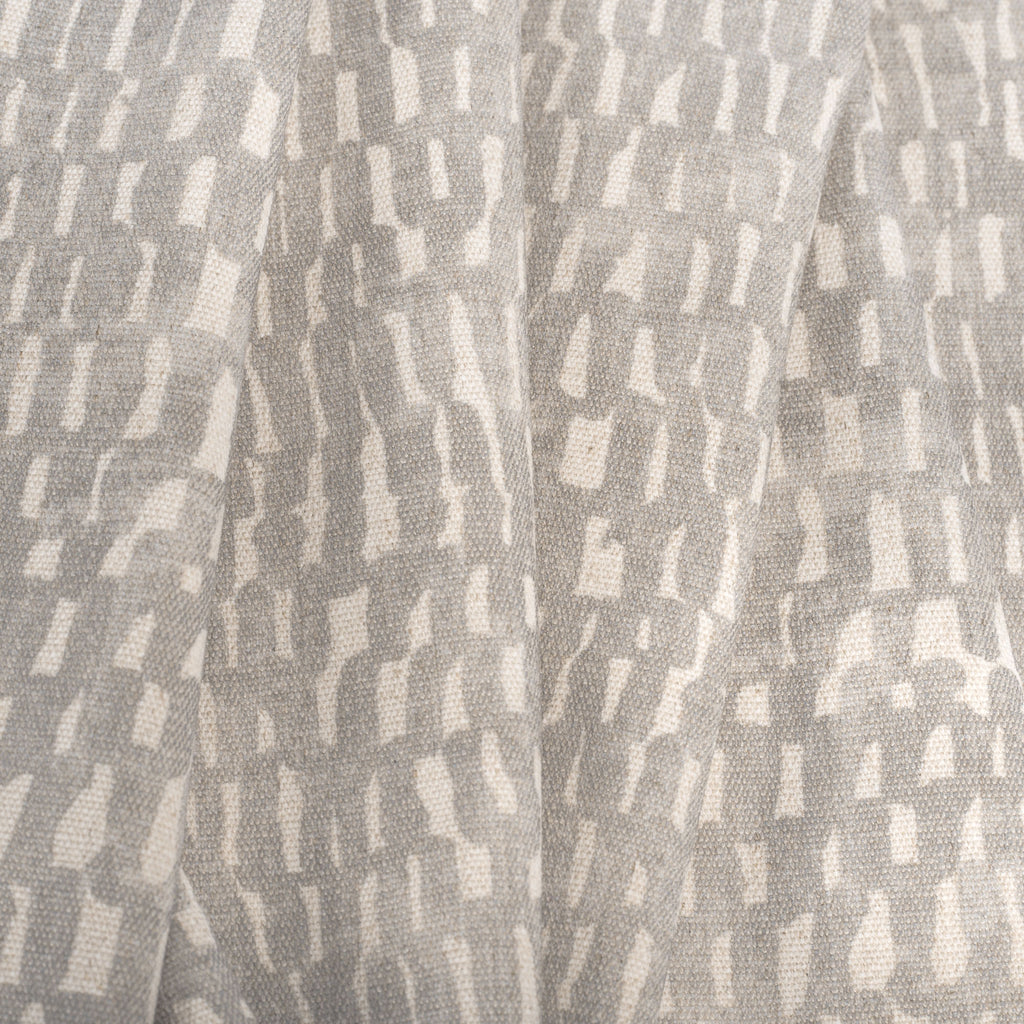 Avareno Silver, a light grey and sandy beige small scale abstract print fabric : close up 