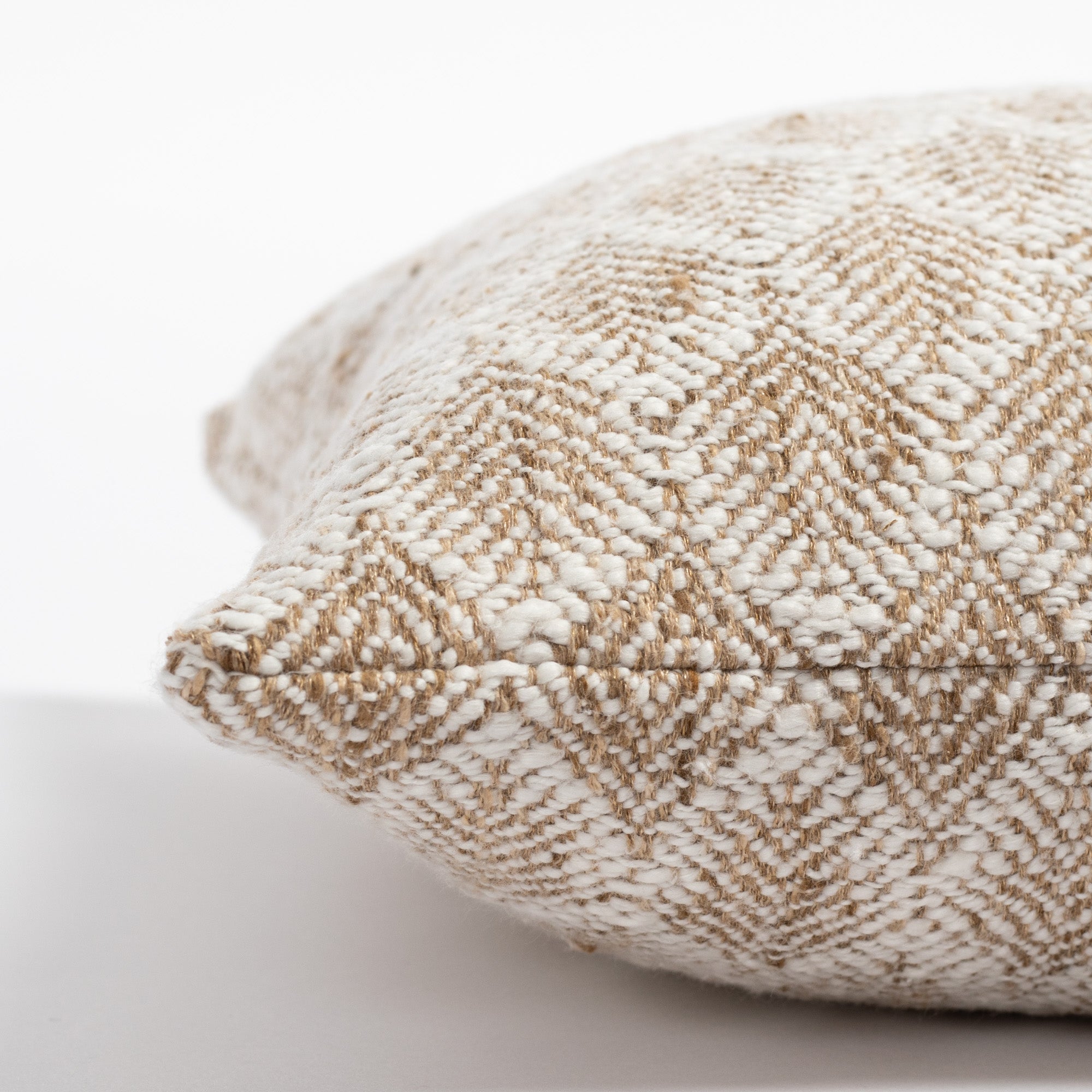 neutral beige and cream pattern lumbar throw pillow : side view