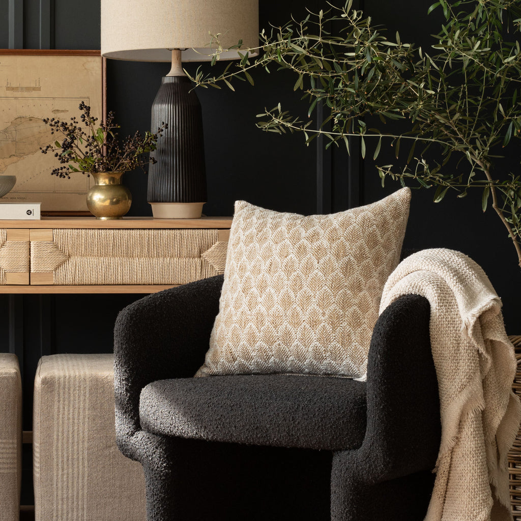 Cozy neutral pillow, ottomans and throw blanket from Tonic Living