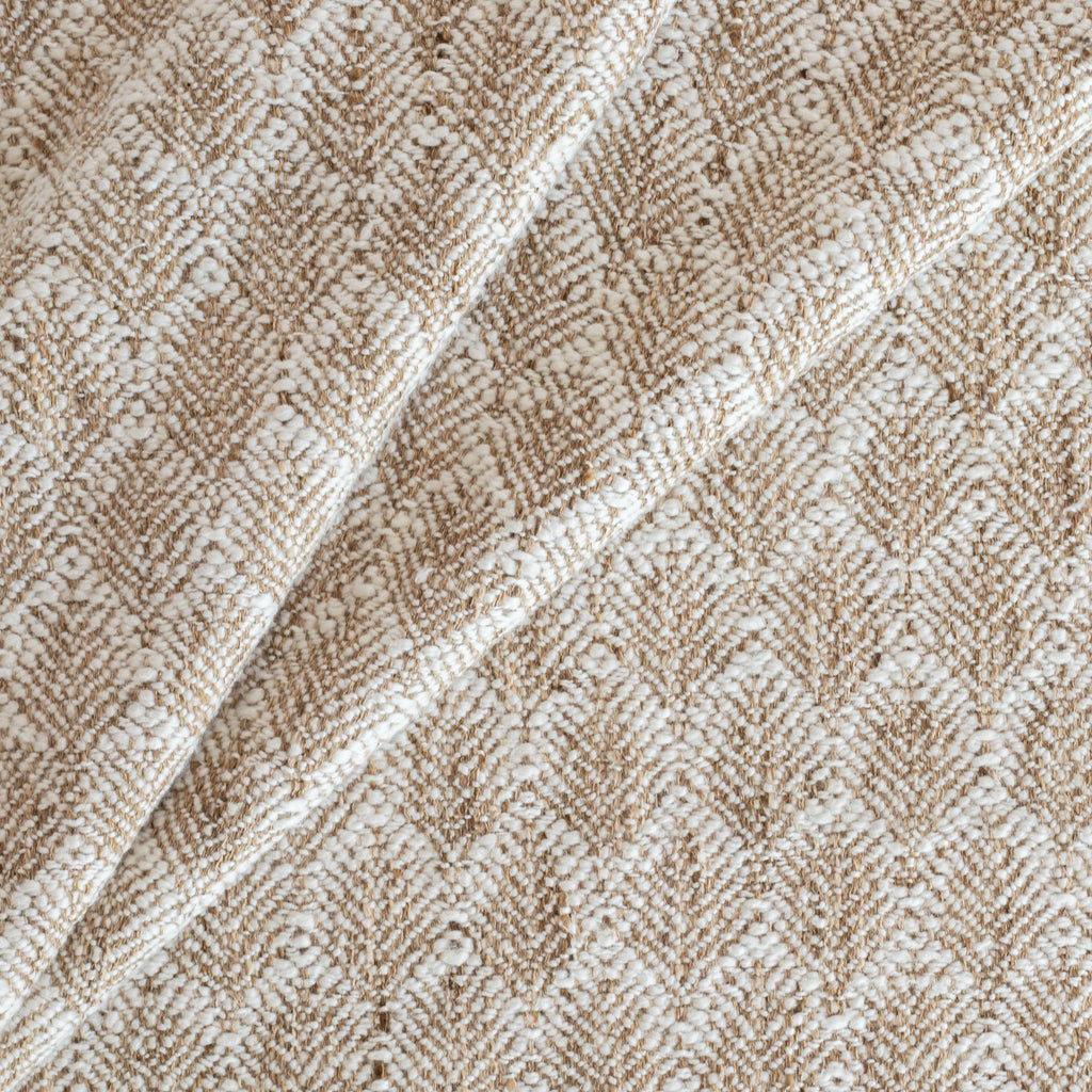 a cream and light brown wheat sheaf pattern upholstery fabric 