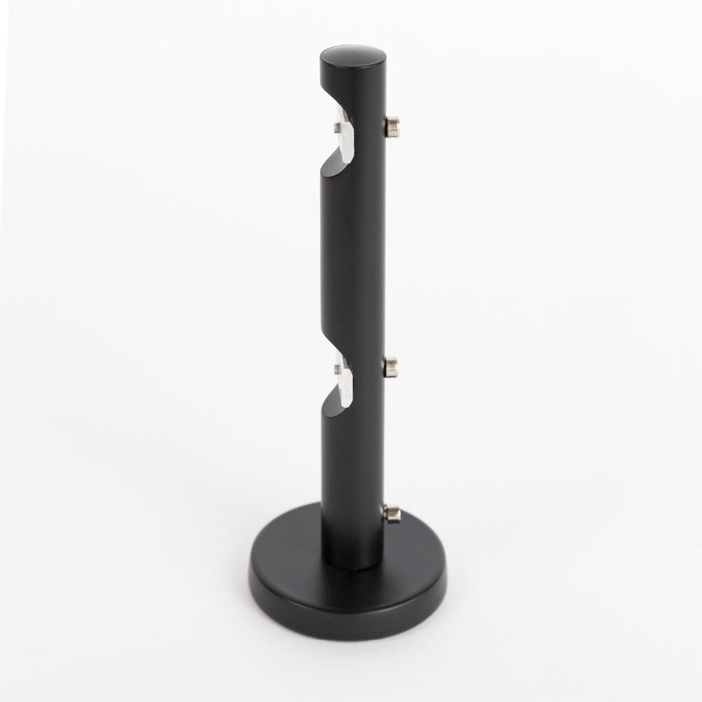 A sturdy black metal double wall mount bracket for channel track drapery rods from Tonic Living