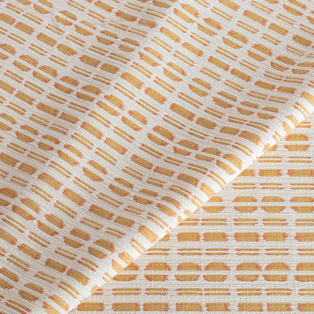 Calima Sunglow tangerine yellow and cream ikat pattern indoor outdoor fabric from Tonic Living