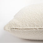 Cambie Boucle Chalk pillow, a cream boucle pillow with a beautiful chunky weave : close up zipper side