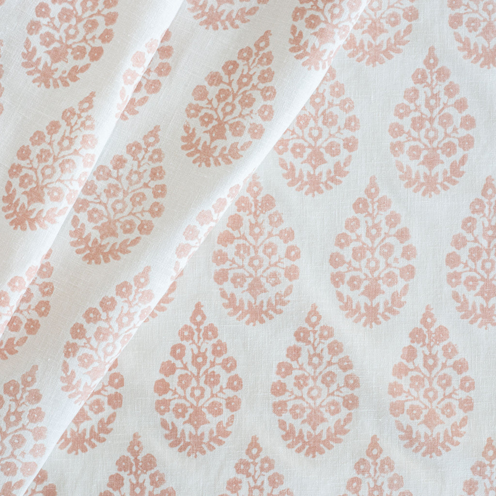 Chandra Fabric Blush Pink, a white with pink floral block print motif drapery fabric from Tonic Living
