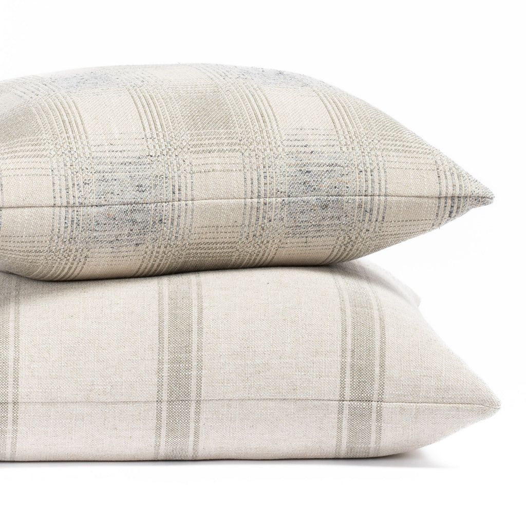 Tonic Living modern farmhouse throw pillows in muted cool light grey and blue tones
