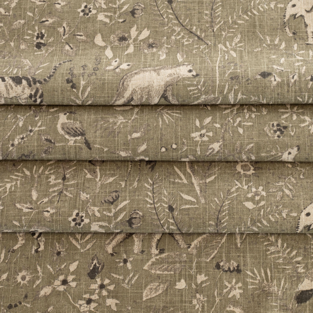 a moss green botanical and exotic animal patterned tonic living fabric 