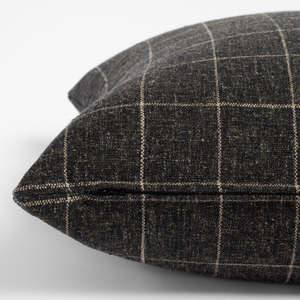Dundee Sable, a charcoal grey and natural windowpane pillow : close up zipper view