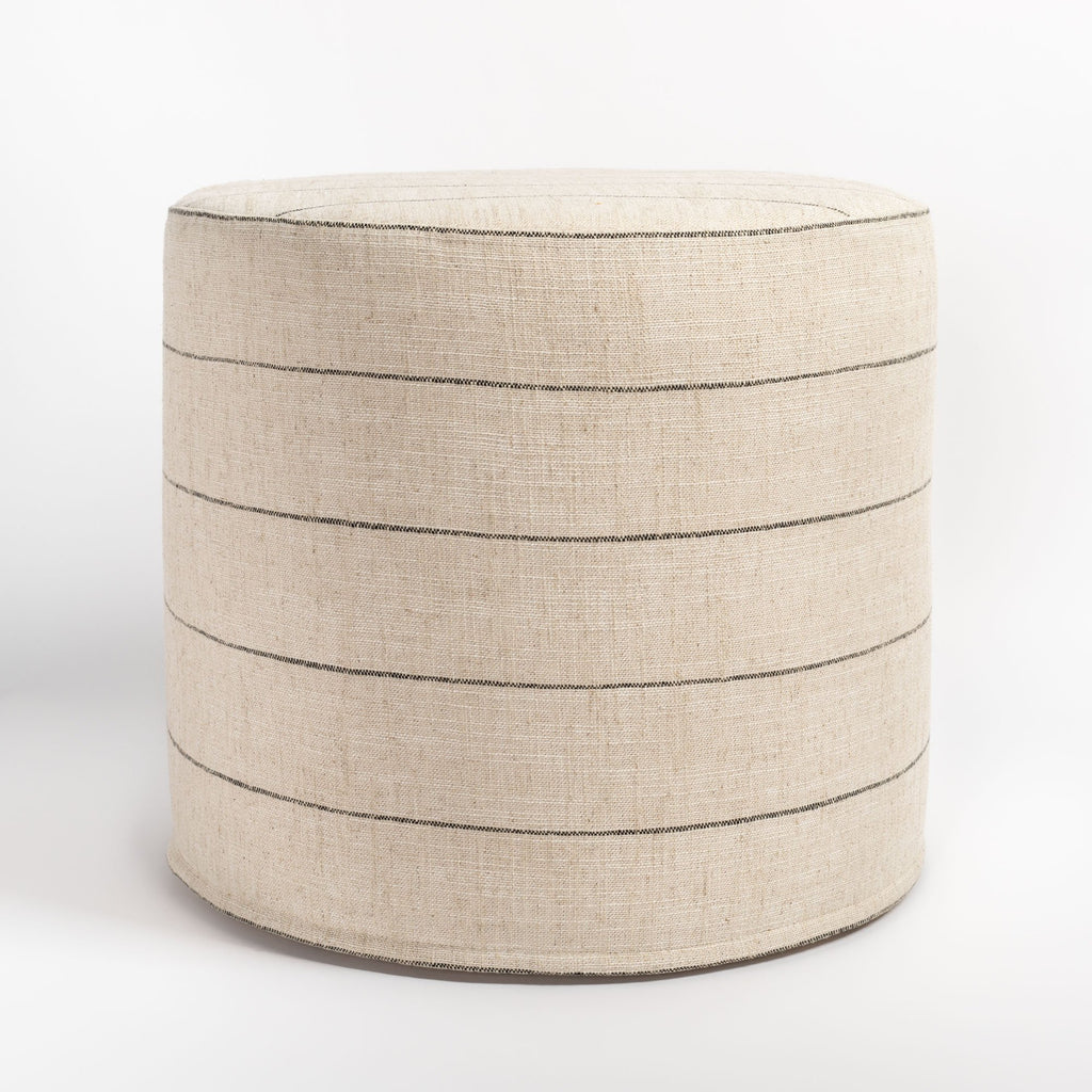 Dunrobin Round Ottoman Burlap, a beige with black stripe fabric round ottoman : close up front view