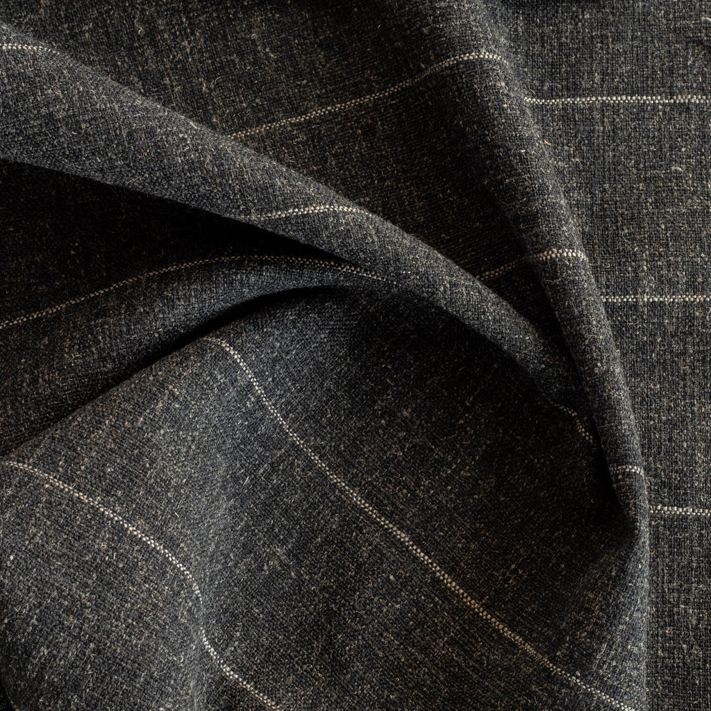 a wool like charcoal grey and brown stripe Tonic Living fabric