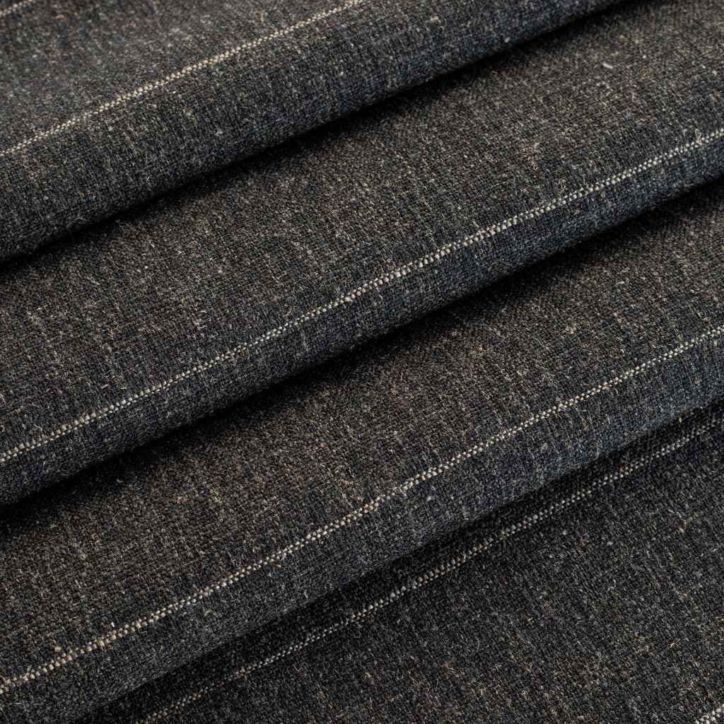 a charcoal grey and tan stripe upholstery fabric