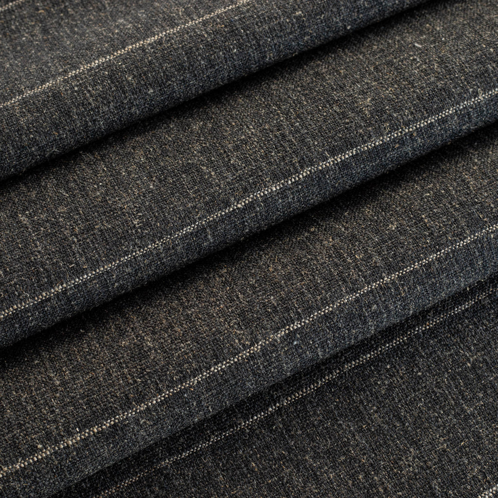 a charcoal grey and tan stripe upholstery fabric