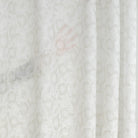a soft white and beige floral print linen sheer drapery fabric