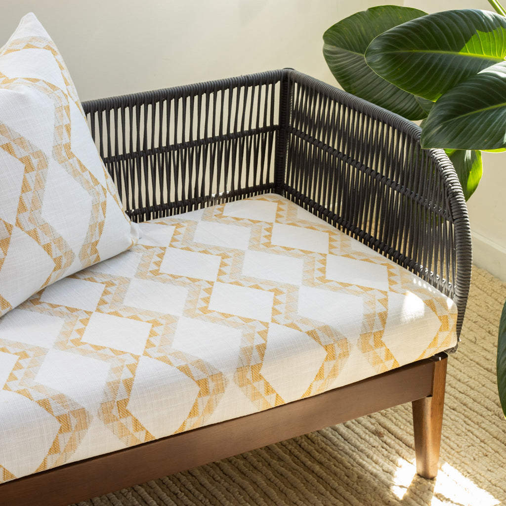 yellow and white diamond pattern fabric upholstered bench cushion and pillow